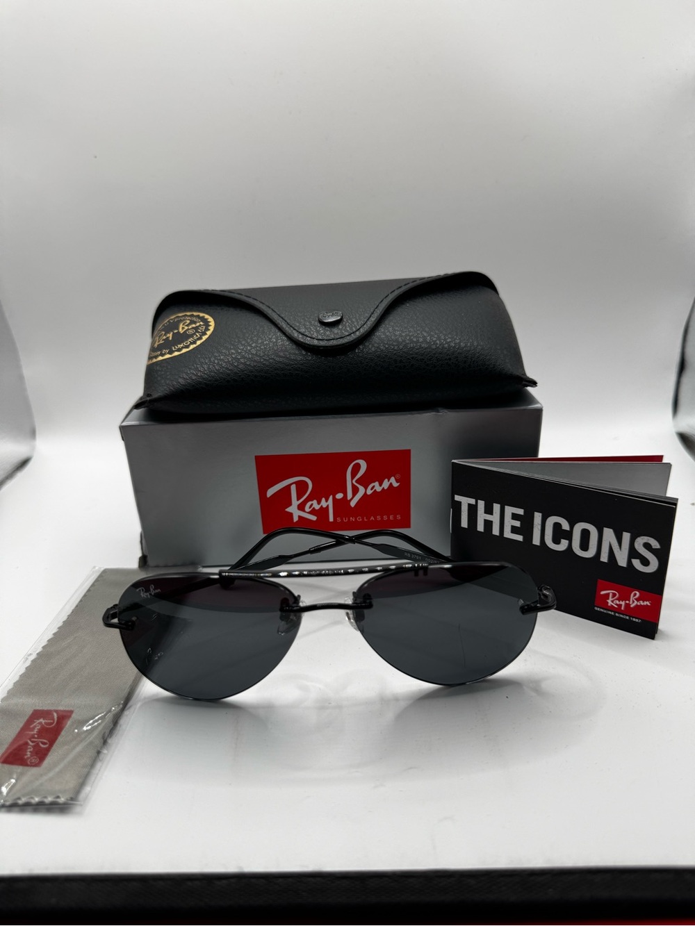 Ray-Ban Men’s Black Rimless Sunglasses with Dark Gray Lenses